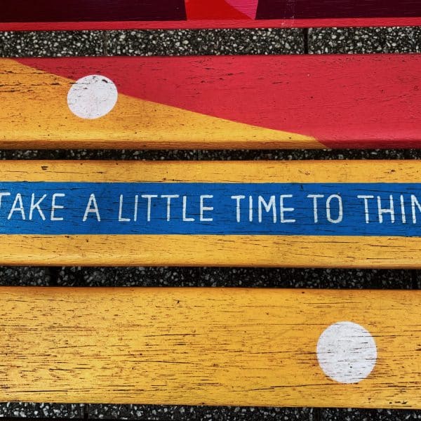 Bench saying 'take a little time to think'